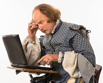 shakespeare with laptop
