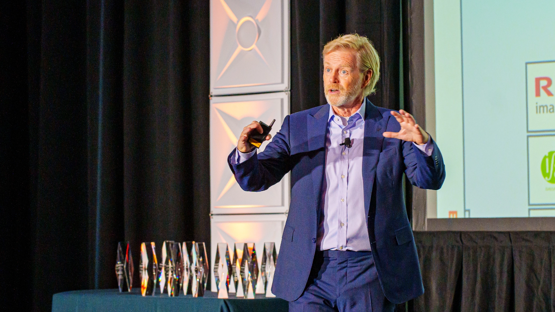 David speaking on stage