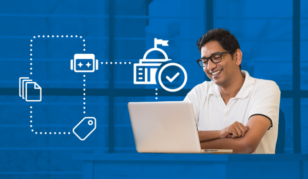 Person on video call on laptop with blue background